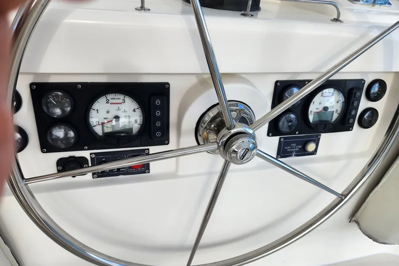 Leopard 46 Yacht Photos Pics Steering wheel and gauges of a 2009 Leopard 46 yacht cockpit.