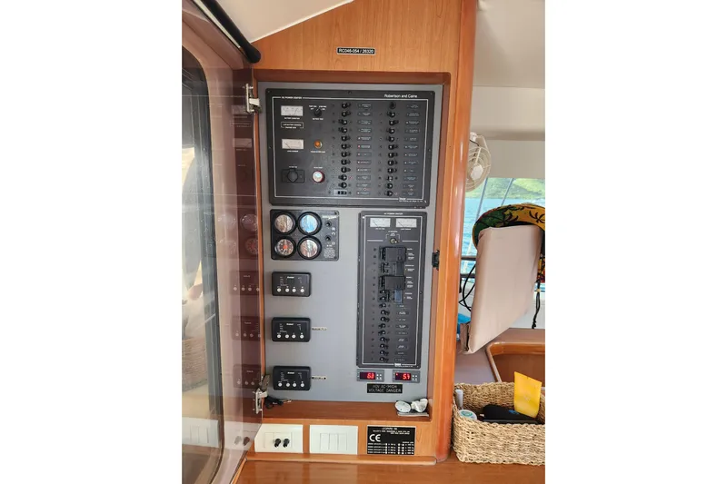 Leopard 46 Yacht Photos Pics Electrical control panel on a 2009 Leopard 46 catamaran, featuring gauges and switches.