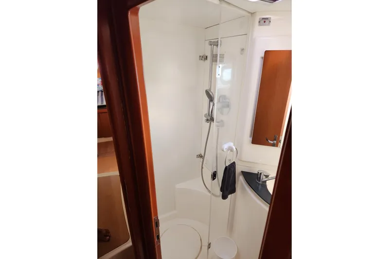 Leopard 46 Yacht Photos Pics Bathroom interior of 2009 Leopard 46 yacht with shower and sink.