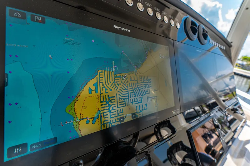 Jet Lag Yacht Photos Pics Navigation system on 2019 Boston Whaler 420 Outrage boat displaying a detailed marine map.