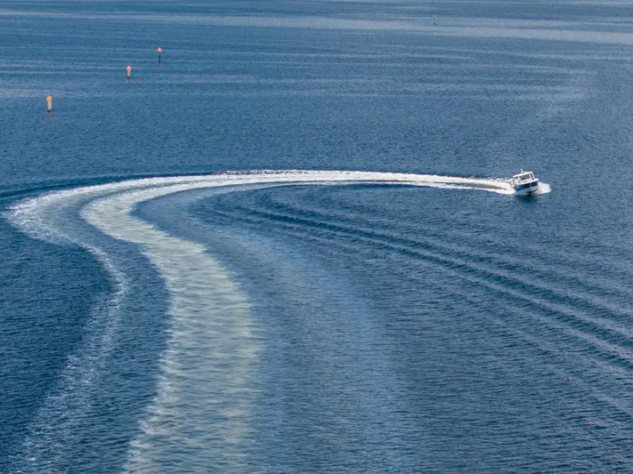 Jet Lag Yacht Photos Pics 2019 Boston Whaler 420 Outrage making a wide turn on open water.