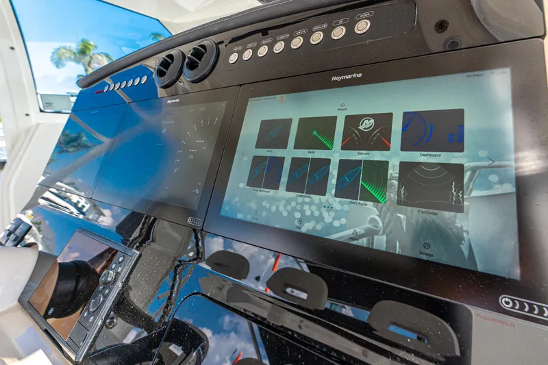 Jet Lag Yacht Photos Pics Control panel of 2019 Boston Whaler 420 Outrage with advanced navigation screens.