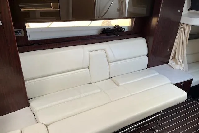  Yacht Photos Pics Luxurious interior of 2019 Monterey 355 Sport Yacht with white leather seating.