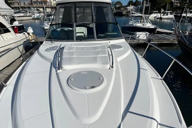  Yacht Photos Pics 2019 Monterey 355 Sport Yacht docked at marina, showcasing sleek design and spacious deck.