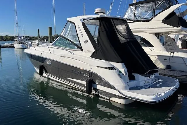  Yacht Photos Pics 2019 Monterey 355 Sport Yacht docked at marina, sleek design, black and white exterior.