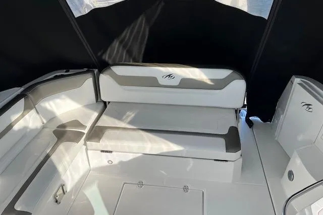  Yacht Photos Pics 2019 Monterey 355 Sport Yacht interior with white seating and black accents.