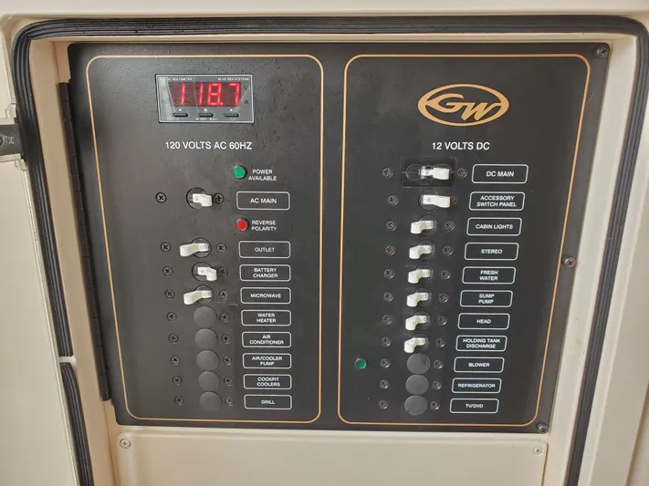  Yacht Photos Pics Grady-White Canyon 336 2017 control panel with 120V AC and 12V DC displays.