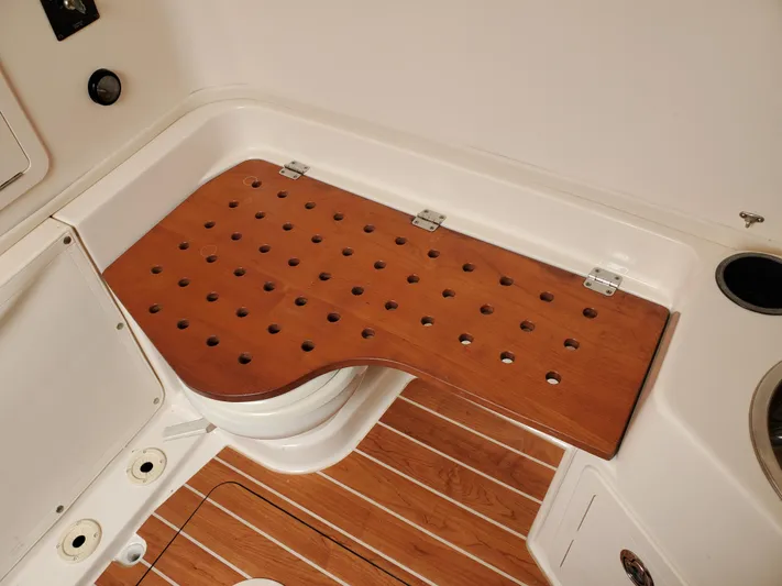  Yacht Photos Pics Grady-White Canyon 336 2017, wooden boat shower with drainage holes.