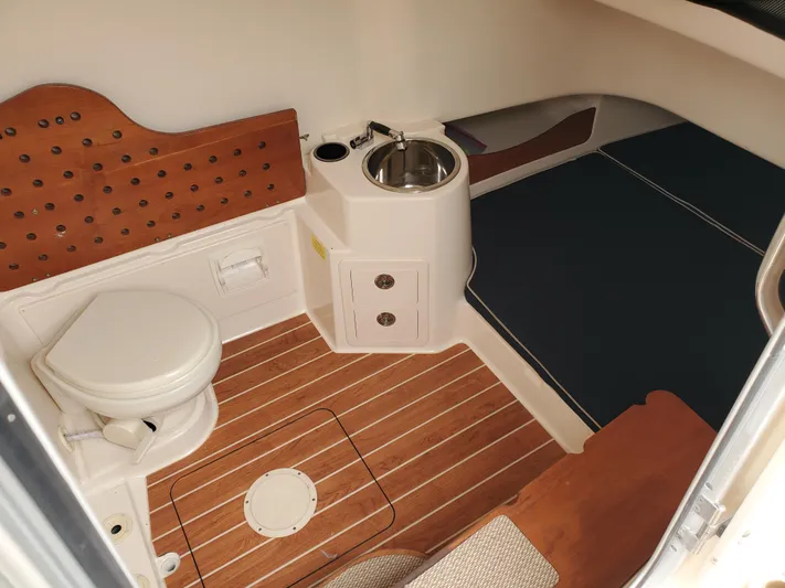  Yacht Photos Pics Interior of 2017 Grady-White Canyon 336 with toilet and sink.