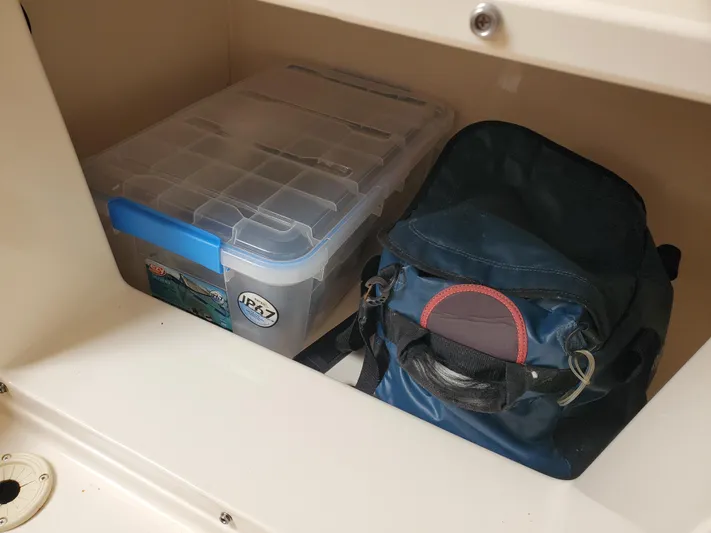  Yacht Photos Pics Storage compartment in Grady-White Canyon 336 boat with bags.