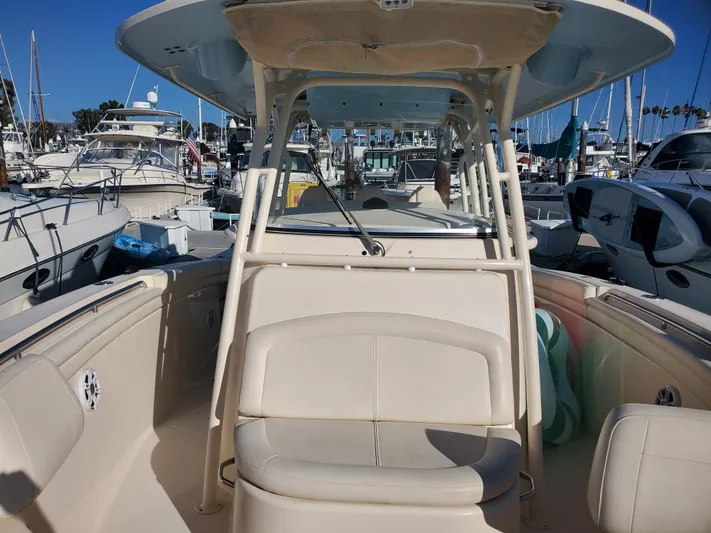  Yacht Photos Pics 2017 Grady-White Canyon 336 boat in harbor, front view.