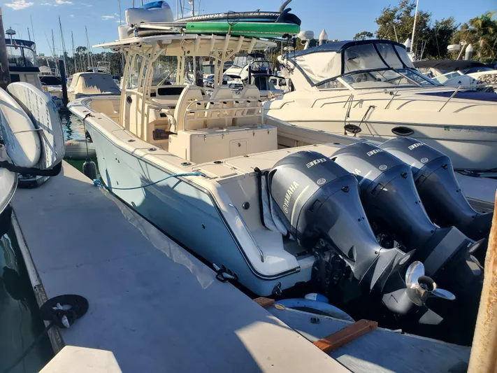  Yacht Photos Pics 2017 Grady-White Canyon 336 boat docked with triple Yamaha engines.
