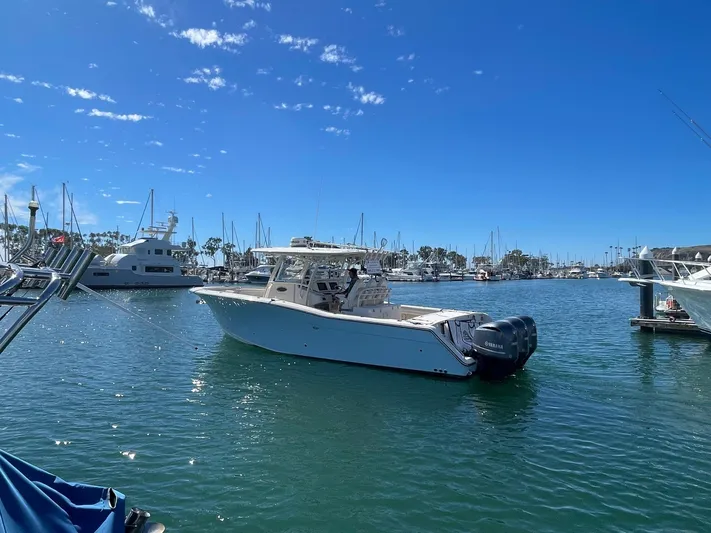  Yacht Photos Pics 2017 Grady-White Canyon 336 boat in a sunny marina setting.