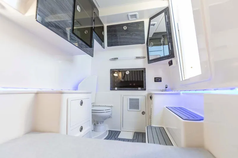 Big Sea Yacht Photos Pics Manufacturer Provided Image: Interior of 2020 Cobia 350 Center Console boat with modern amenities.