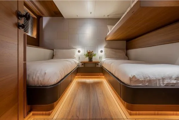 Canova Yacht Photos Pics Luxurious cabin interior of 2019 Baltic sailing yacht with twin beds and elegant lighting.