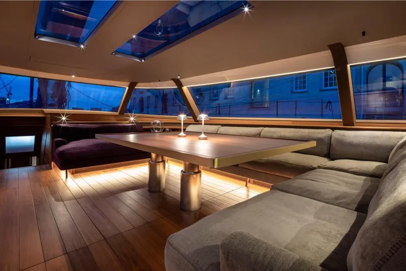 Canova Yacht Photos Pics Luxurious interior of 2019 Baltic Light Displacement Sailing Yacht with elegant seating and ambient lighting.