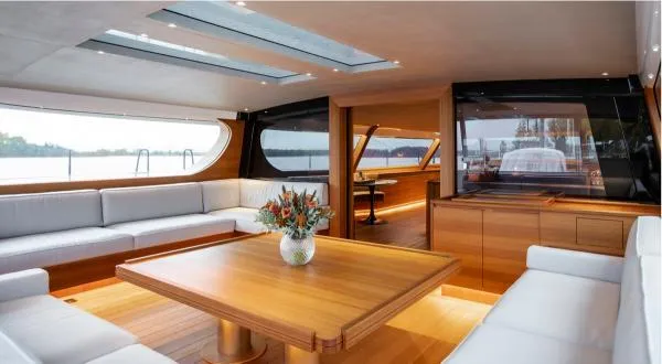 Canova Yacht Photos Pics Luxurious interior of a 2019 Baltic Light Displacement Sailing Yacht with elegant wood finishes.