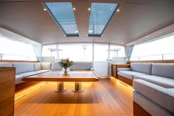 Canova Yacht Photos Pics Luxurious interior of 2019 Baltic Light Displacement Sailing Yacht with skylights and elegant seating.