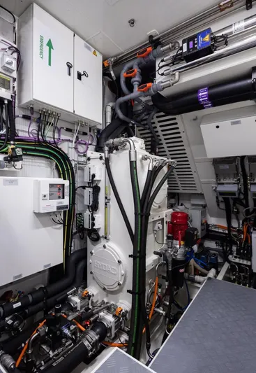 Canova Yacht Photos Pics Engine room of a 2019 Baltic Light Displacement Sailing Yacht, showcasing complex machinery and wiring.