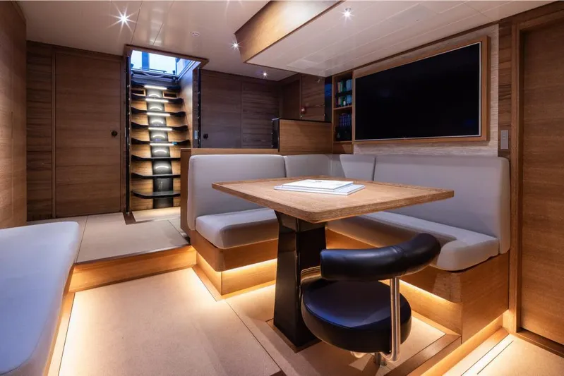 Canova Yacht Photos Pics Luxurious interior of 2019 Baltic Light Displacement Sailing Yacht with modern seating and ambient lighting.