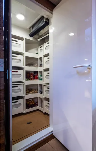 Canova Yacht Photos Pics Pantry storage on 2019 Baltic Light Displacement Sailing Yacht, featuring organized shelves and ample space.