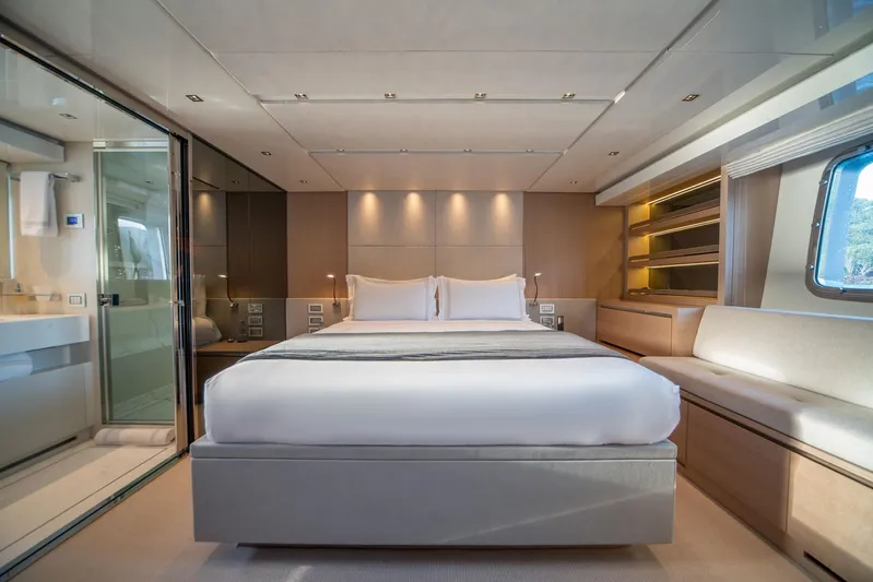 Squalo Yacht Photos Pics Luxurious bedroom interior of 2018 Sanlorenzo SL86 yacht with modern design and elegant furnishings.
