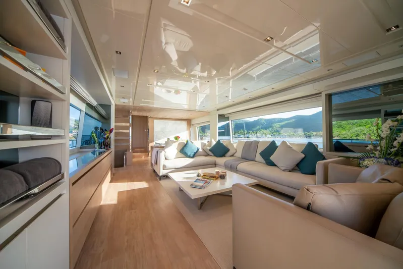 Squalo Yacht Photos Pics Luxurious interior of 2018 Sanlorenzo SL86 yacht with modern furnishings and scenic views.