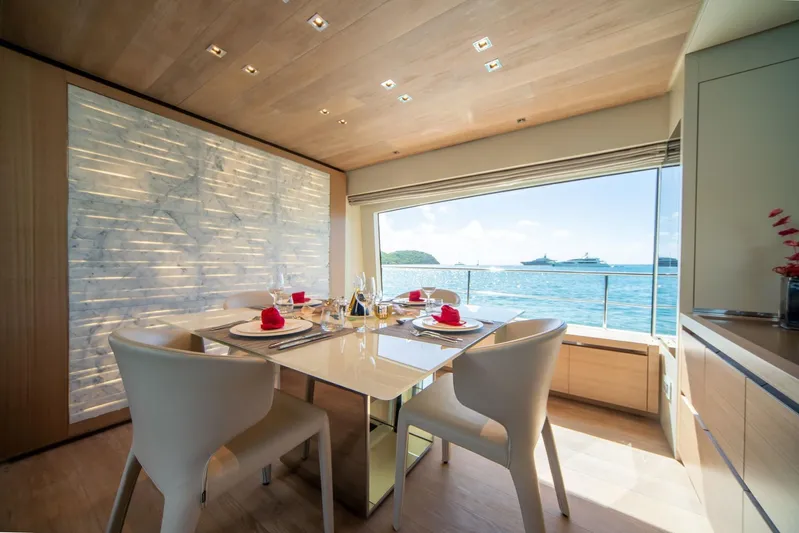 Squalo Yacht Photos Pics Luxurious dining area on 2018 Sanlorenzo SL86 yacht with ocean view.