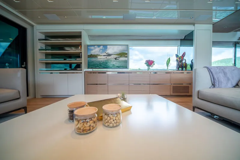 Squalo Yacht Photos Pics Luxurious interior of 2018 Sanlorenzo SL86 yacht with elegant decor and scenic views.