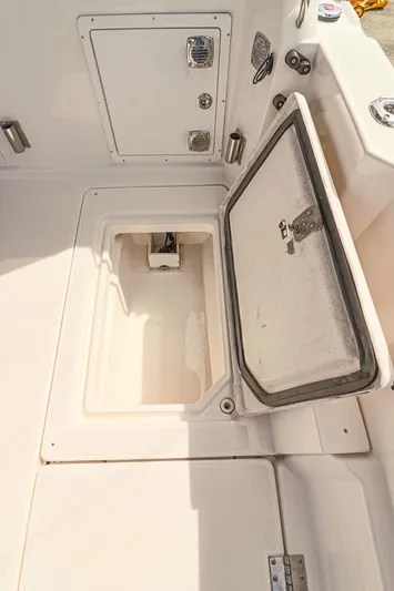 Arrow II Yacht Photos Pics Open storage compartment on 2019 Aspen C107 boat deck.