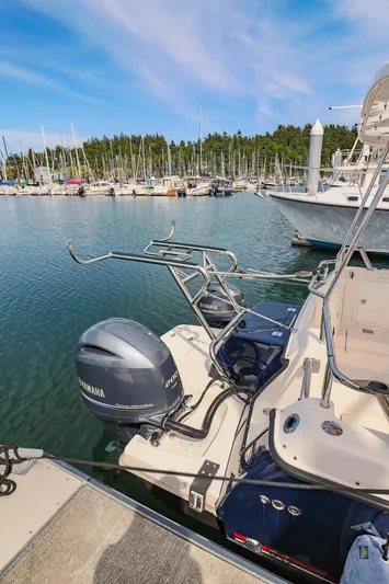 Arrow II Yacht Photos Pics Aspen C107 2019 boat docked in marina with Yamaha outboard motor.