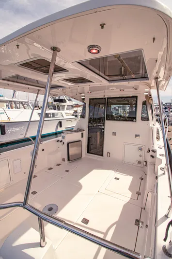 Arrow II Yacht Photos Pics 2019 Aspen C107 boat interior with spacious deck and modern amenities.