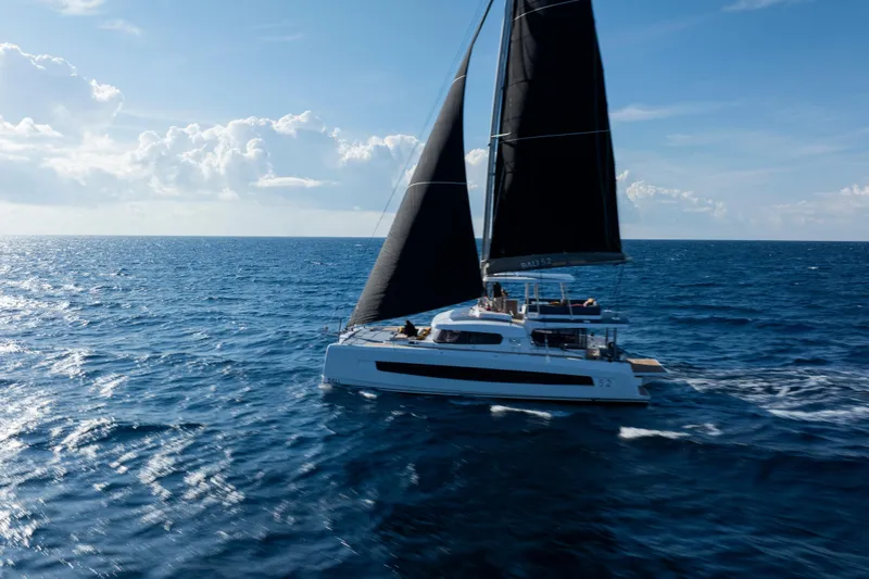  Yacht Photos Pics Sailing catamaran Bali 5.2, 2026 model, cruising on open ocean under clear skies.