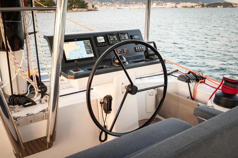  Yacht Photos Pics Helm of 2026 Bali 5.2 yacht with navigation screens and steering wheel.