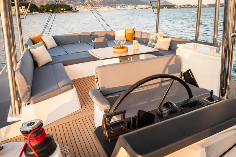  Yacht Photos Pics Luxurious 2026 Bali 5.2 yacht interior with elegant seating and scenic ocean view.