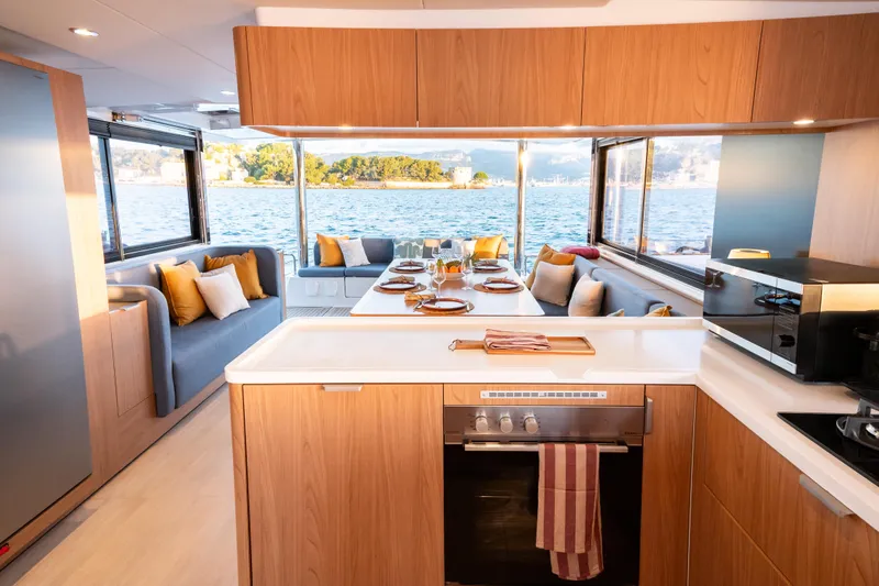  Yacht Photos Pics Luxurious Bali 5.2 yacht interior with modern kitchen and scenic ocean view, 2026 model.