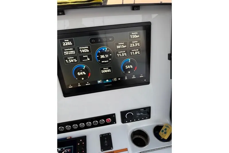  Yacht Photos Pics Dashboard of 2023 Contender 32 ST boat with Garmin display and controls.