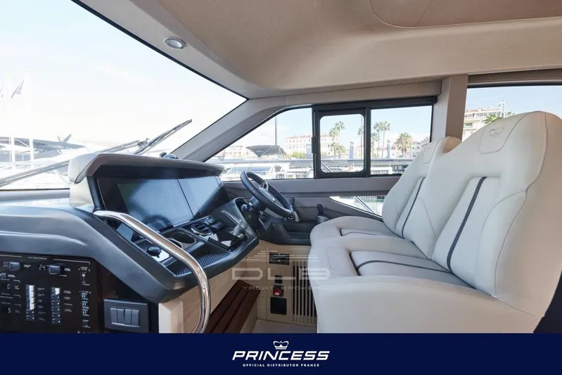  Yacht Photos Pics 2023 Princess F50 yacht interior with modern helm and luxurious seating.