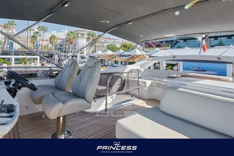  Yacht Photos Pics Luxurious 2023 Princess F50 yacht interior with elegant seating and modern design.