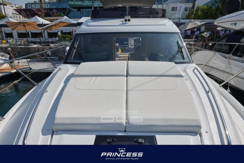  Yacht Photos Pics 2023 Princess F50 yacht at marina, showcasing sleek design and luxury features.