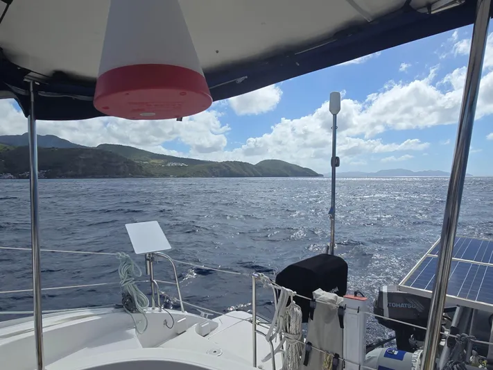 Think Twice Yacht Photos Pics 2005 Fountaine Pajot Lavezzi Maestro sailing on open sea with scenic coastal view.