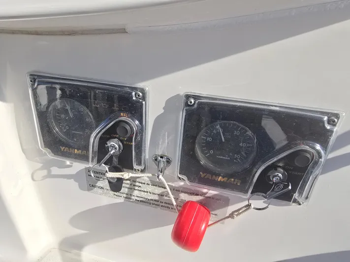Think Twice Yacht Photos Pics Control panel of 2005 Fountaine Pajot Lavezzi Maestro catamaran with gauges and switches.
