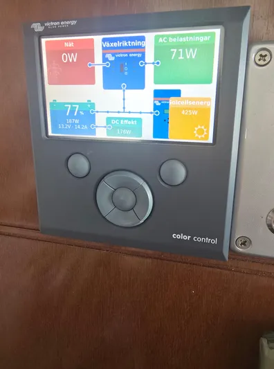 Think Twice Yacht Photos Pics Control panel on 2005 Fountaine Pajot Lavezzi Maestro catamaran displaying energy usage.