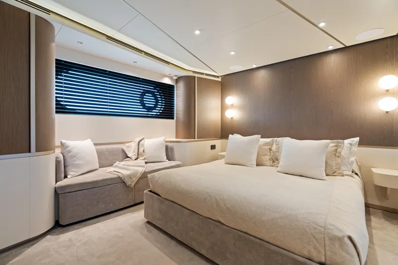 Life Yacht Photos Pics Luxurious bedroom interior on 2022 Azimut Magellano 25 Metri yacht, featuring modern design and cozy ambiance.