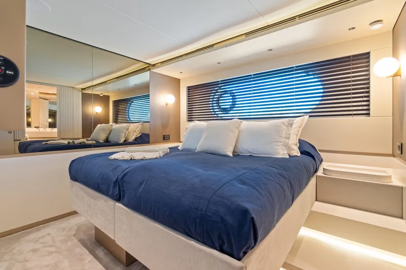 Life Yacht Photos Pics Luxurious bedroom interior on 2022 Azimut Magellano 25 Metri yacht with modern design.