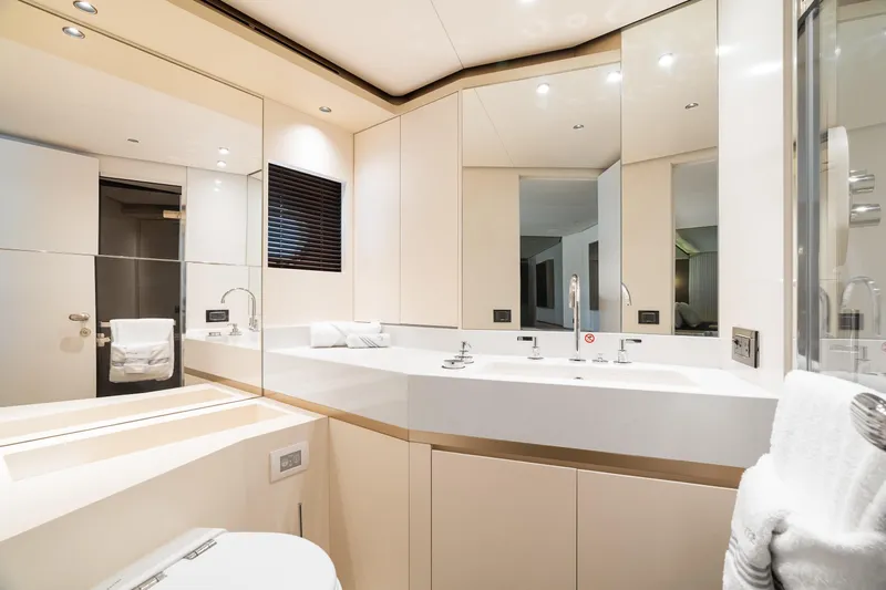 Life Yacht Photos Pics Luxurious bathroom interior on 2022 Azimut Magellano 25 Metri yacht, featuring modern fixtures and elegant design.