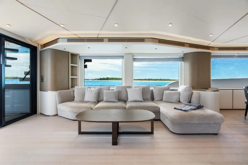 Life Yacht Photos Pics Luxurious interior of 2022 Azimut Magellano 25 Metri yacht with modern seating and ocean view.