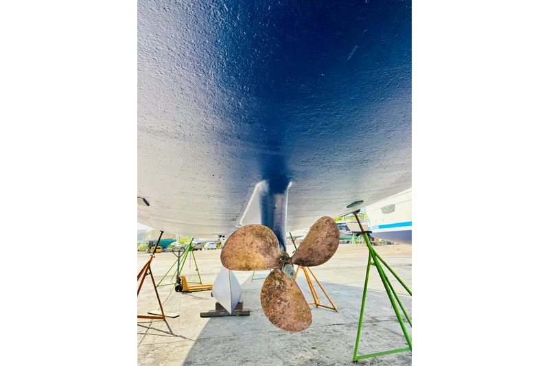 Magique 2 Yacht Photos Pics Underwater view of 2005 Beneteau Oceanis 523 sailboat propeller on dry dock.