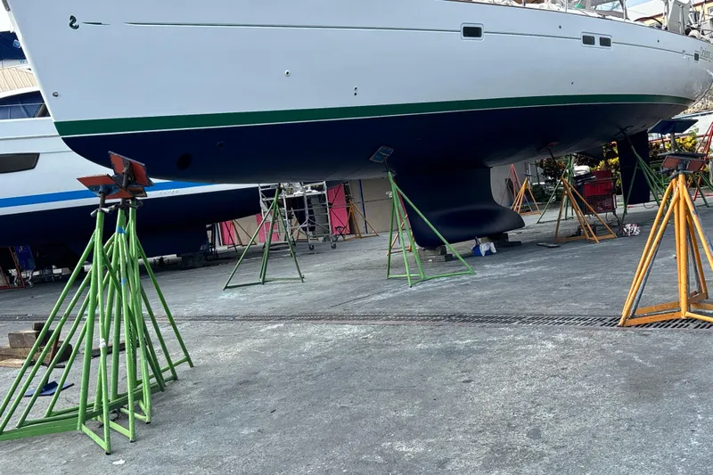 Magique 2 Yacht Photos Pics Beneteau Oceanis 523 yacht from 2005 on stands in a boatyard.