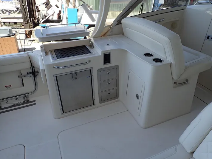  Yacht Photos Pics 2021 Grady-White Freedom 325 boat interior with seating and storage compartments.